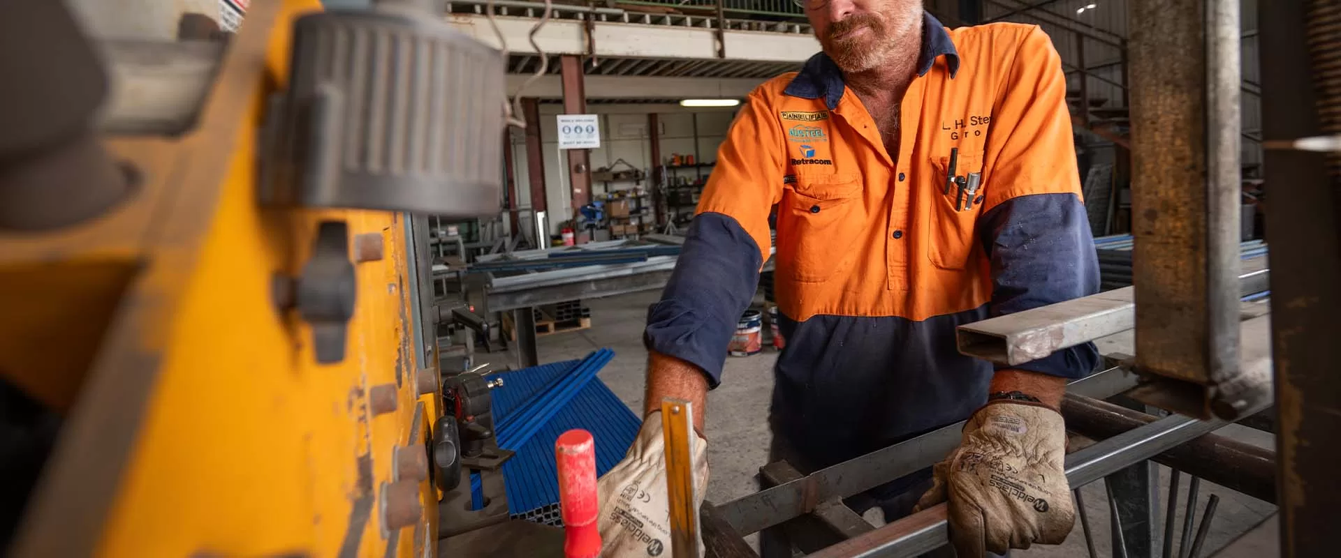 man working with steel